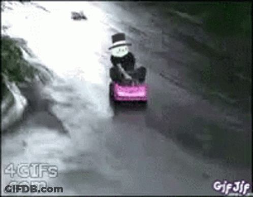 Man In Top Hat Driving Pink Toy Car GIF