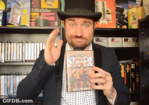 Man In Top Hat Holding Street Fighter GIF
