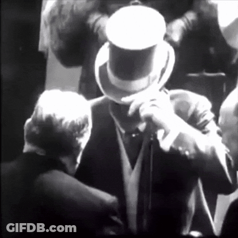 Man In Top Hat In Crowd GIF