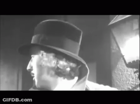 Man In Top Hat Smoking GIF