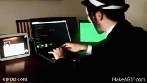 Man In Top Hat Typing GIF
