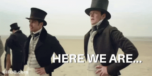 Man In Top Hat With Another Man Saying Here We Are GIF