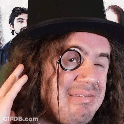 Man In Top Hat With Magnifying Glass GIF