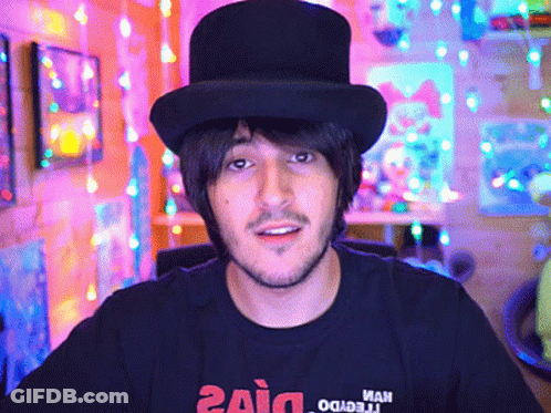 Man In Top Hat With Zaid T-Shirt GIF