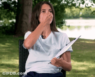Man In Tottenham Hotspur Jersey Covering Nose GIF