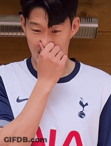 Man In Tottenham Jersey Covering Nose GIF