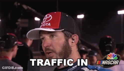 Man In Toyota Hat Says Traffic In NASCAR Logo GIF