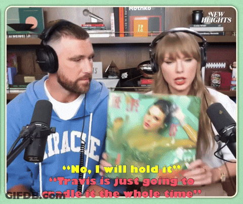 Man In Travis Hoodie Holding Woman Picture GIF