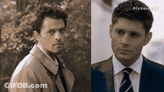 Man In Trench Coat And Man In Suit And Tie GIF