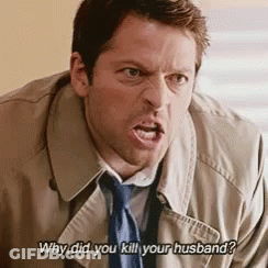 Man In Trench Coat And Tie Screaming GIF