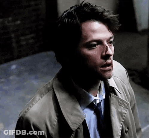 Man In Trench Coat And Tie With Bloody Nose GIF