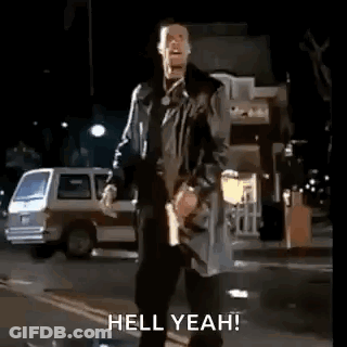 Man In Trench Coat Arms Outstretched Hell Yeah GIF