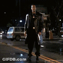Man In Trench Coat Dancing GIF