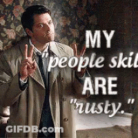 Man In Trench Coat Giving Peace Sign My People Skill Are Rusty GIF