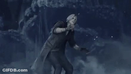 Man In Trench Coat Holding Gun In Dark Room GIF