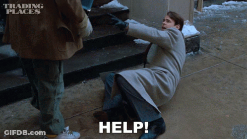Man In Trench Coat Kneeling And Asking For Help GIF