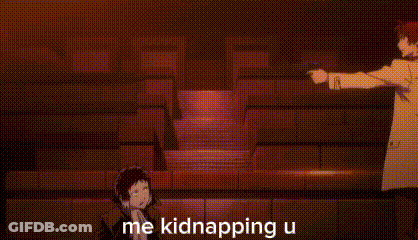 Man In Trench Coat Pointing Gun At Man In Black Suit GIF