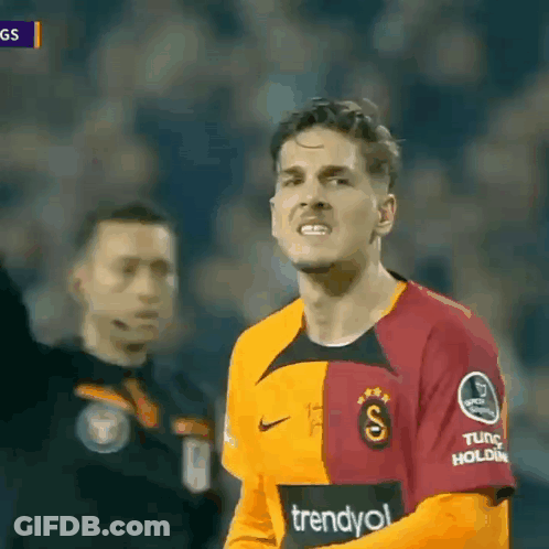 Man In Trendyol Jersey In Front Of Referee GIF