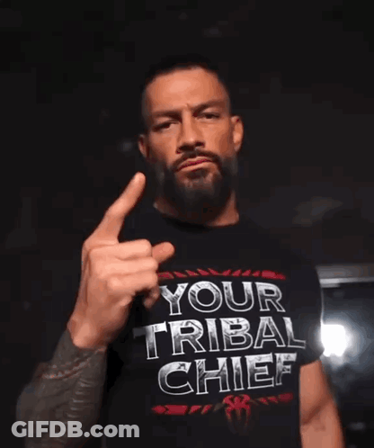 Man In Tribal Chief Shirt Giving Middle Finger GIF