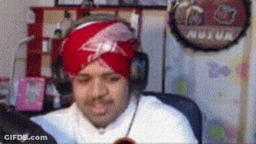 Man In Turban And Headphones At Computer GIF