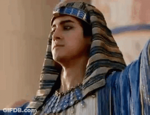Man In Turban And Necklace With Arms Outstretched GIF
