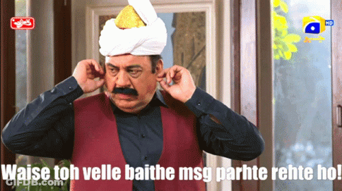 Man In Turban Covering Ears GIF
