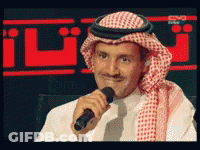 Man In Turban Holding Microphone GIF