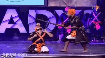 Man In Turban Holding Stick Saying Army GIF