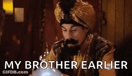 Man In Turban Looking At Crystal Ball GIF
