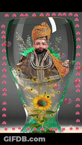 Man In Turban Surrounded By Flowers GIF