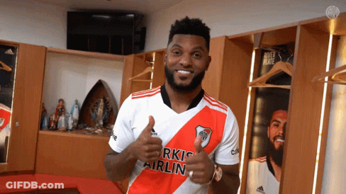 Man In Turkish Airlines Shirt Giving Thumbs Up GIF