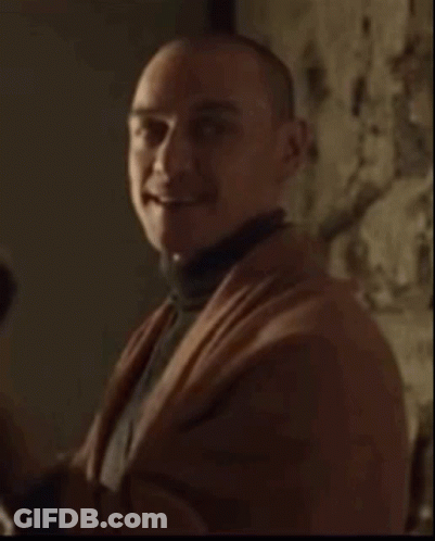 Man In Turtleneck And Scarf Smiling GIF
