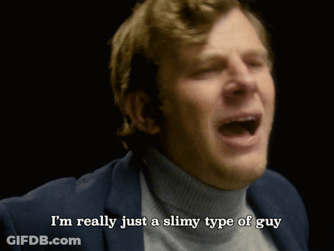 Man In Turtleneck And Suit Saying I'm Really Just A Slimy Type Of Guy GIF