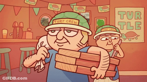 Man In Turtleneck Hat Carrying Wood GIF