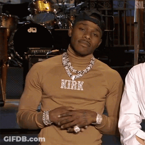 Man In Turtleneck With Necklace Saying Kirk GIF