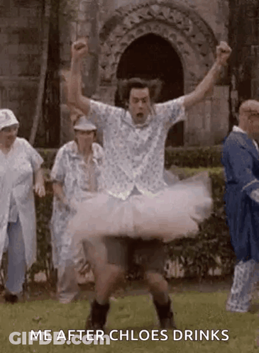 Man In Tutu Dancing In Field GIF