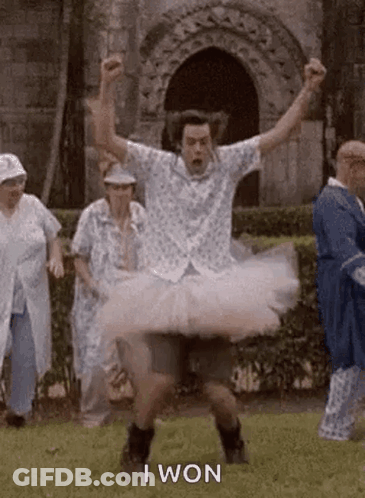 Man In Tutu Dancing In Field GIF