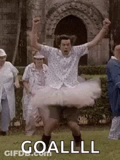 Man In Tutu Dancing In Field GIF