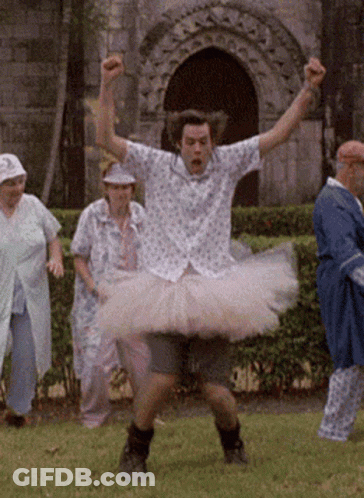 Man In Tutu Dancing In Field GIF