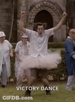 Man In Tutu Dancing In Field GIF