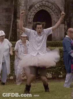Man In Tutu Dancing In Field GIF