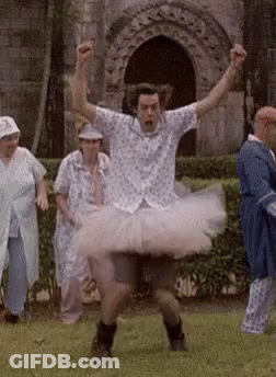 Man In Tutu Dancing In Park GIF