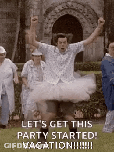 Man In Tutu Jumping As Crowd Watches GIF