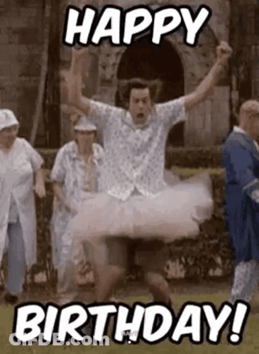 Man In Tutu Jumping While Group Celebrates Birthday GIF
