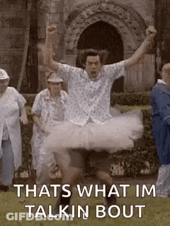 Man In Tutu Jumping While People Watch GIF