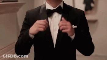 Man In Tuxedo Adjusting Jacket GIF