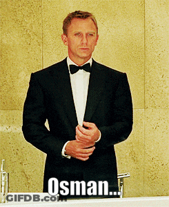 Man In Tuxedo And Bow Tie At Sink With Word Osman GIF