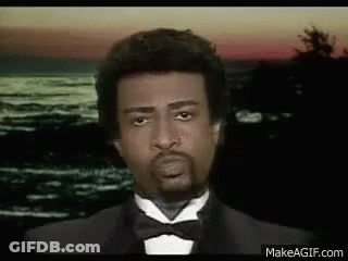 Man In Tuxedo And Bow Tie By Water GIF