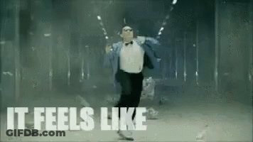 Man In Tuxedo And Bow Tie Dancing In Dark Room It Feels Like GIF