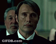 Man In Tuxedo And Bow Tie Looking At Camera GIF